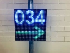 DS-320×320-P8 displaying 034 with a right-pointing arrow