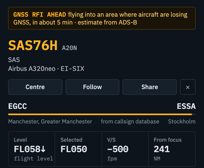 An airliner tagged GNSS RFI AHEAD on the live map