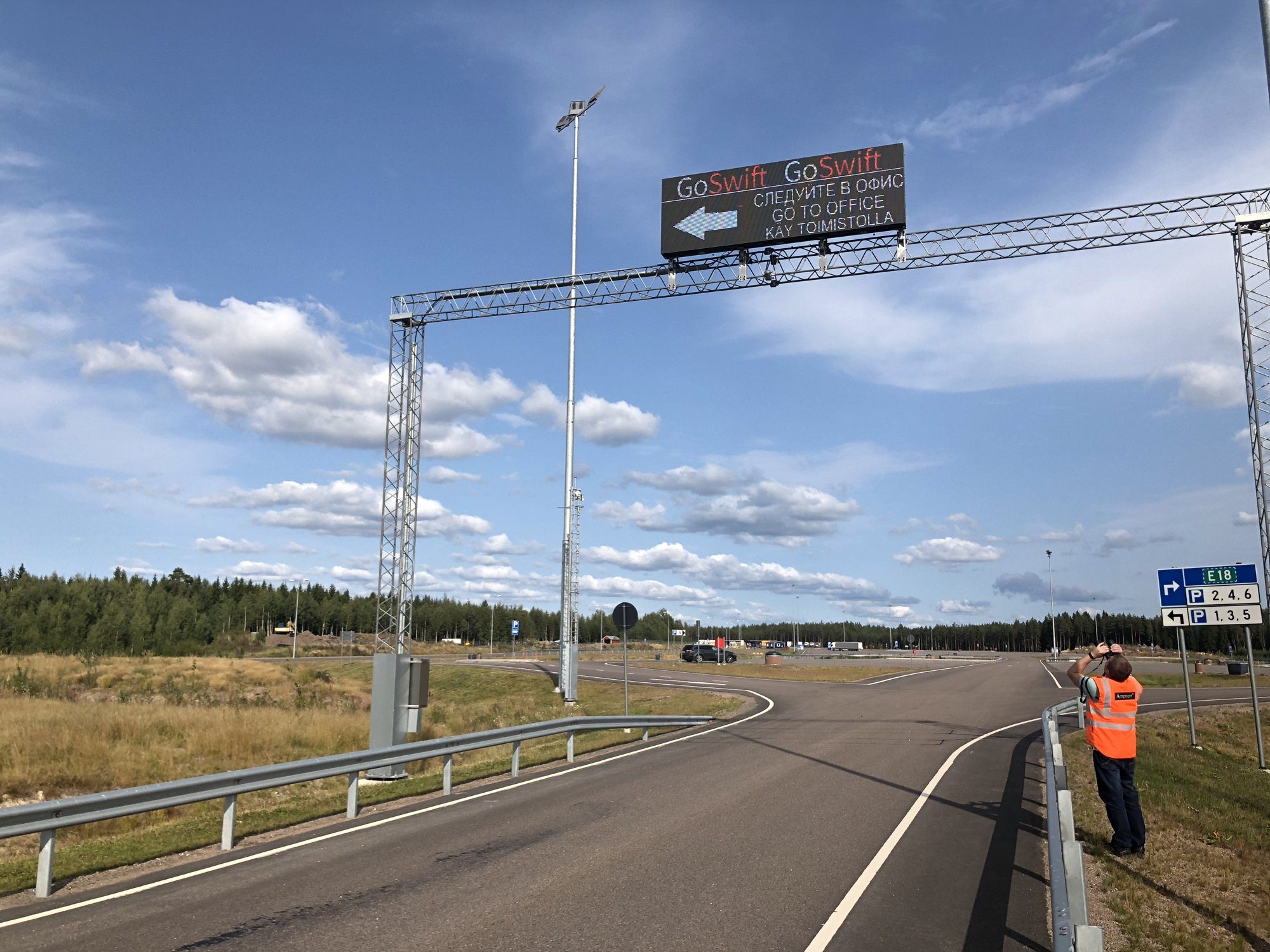GoSwift LED message board on a gantry over the approach road to the Vaalimaa border crossing.