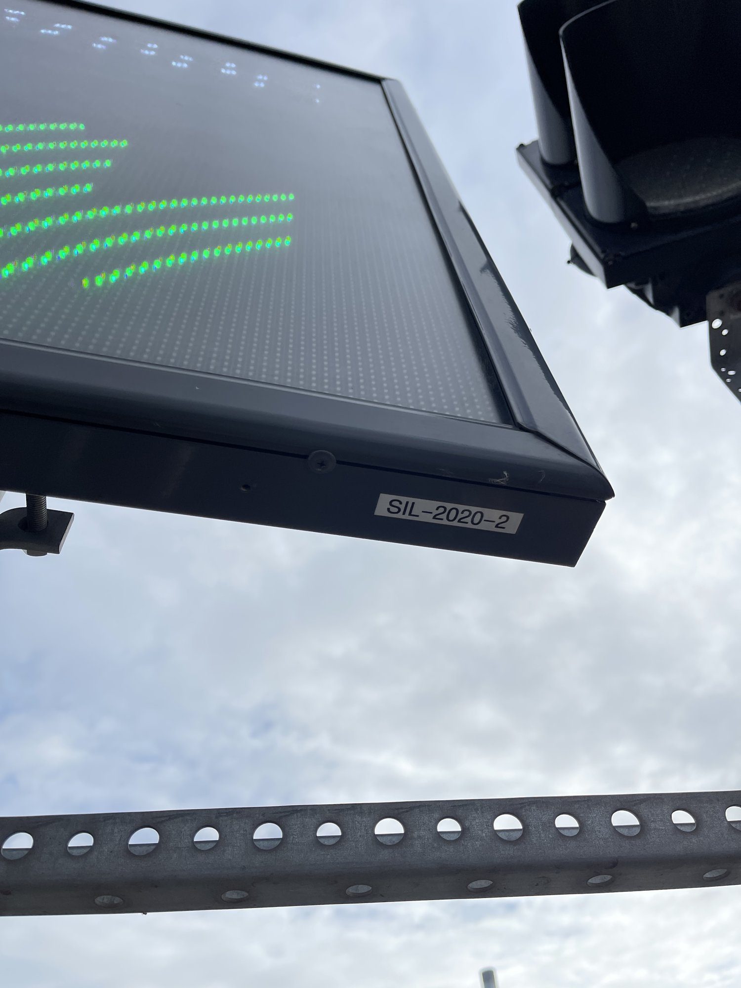 Close-up of the green LED arrow on the Port of Sillamäe weighbridge display.